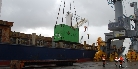 The loading of over-size items into the hold of the vessel to the port of Kolkata, India